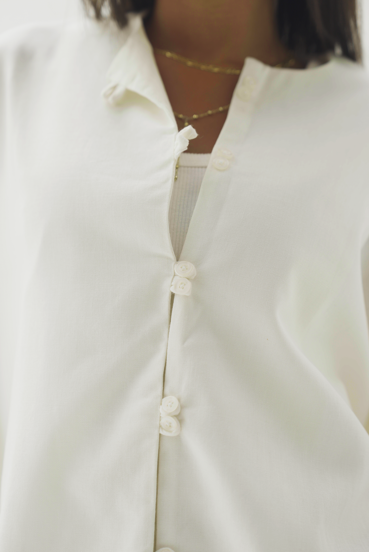 Double buttoned white linen chemise