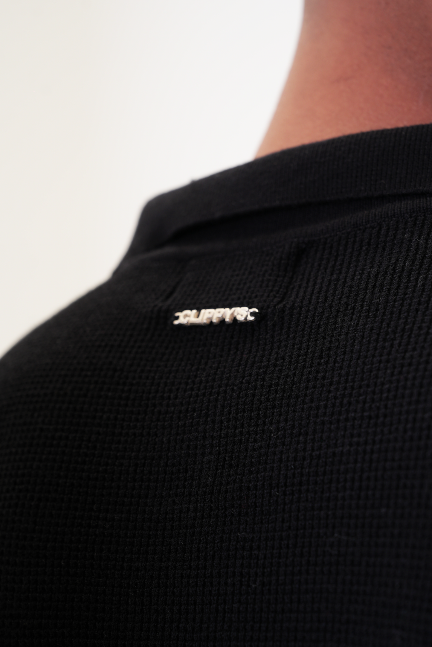 Black knit polo T-shirt